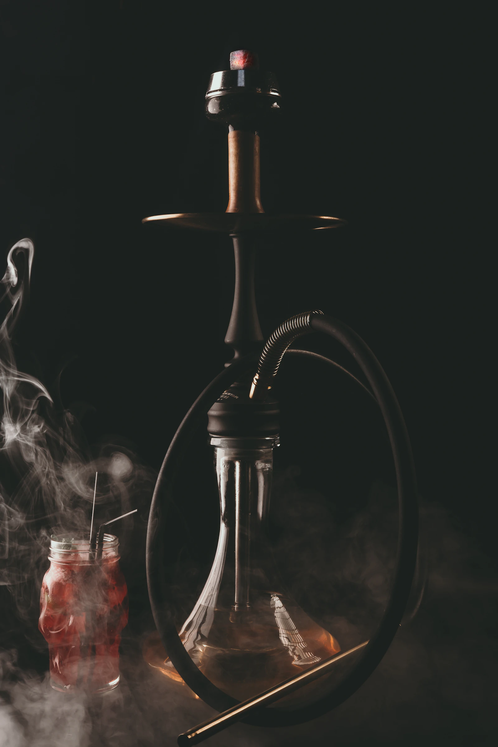 An elegant hookah in warm light