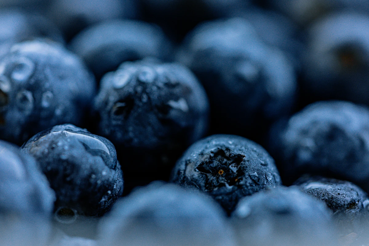 Blueberries on a dark surface